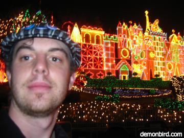 Good looking guy infront of Its a Small World